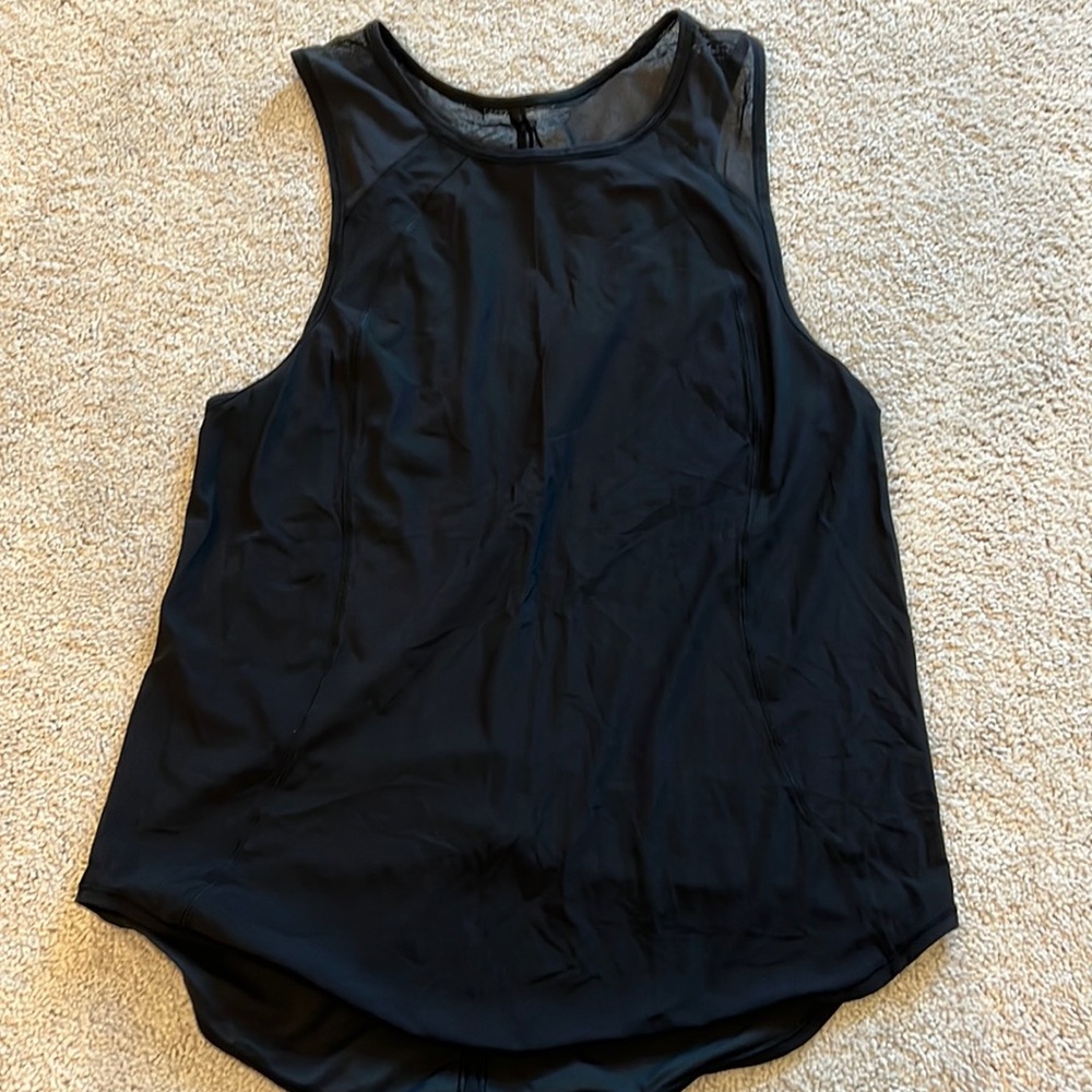Lululemon black mesh back tank top. Size 8 or 10. Great condition.